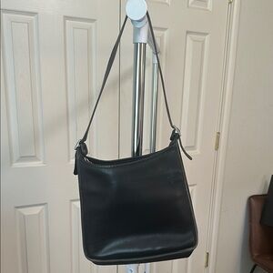 Elegant Black Leather Shoulder Bag by Coach
